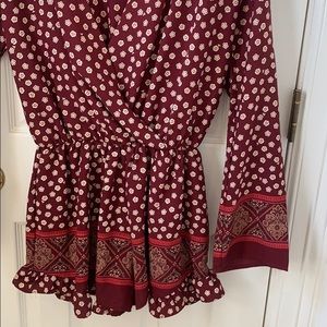 Maroon white and gold long sleeve romper